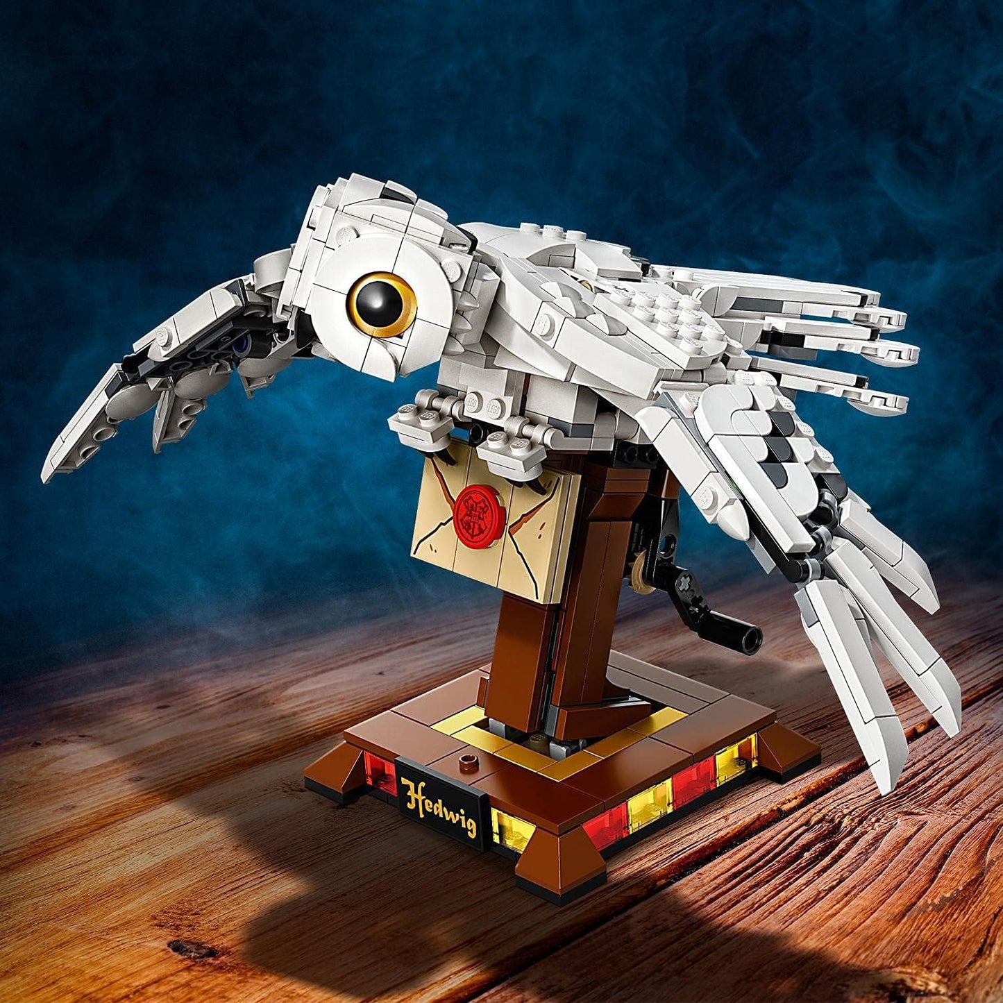 Assembled LEGO Hedwig 75979 with flapping wings on display stand